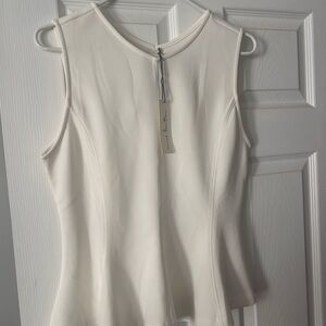 White Sleeveless Peplum Top